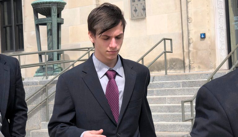In this April 3, 2019, file photo, Casey Viner, an Ohio gamer accused of recruiting a prankster to make a bogus emergency call, leaves federal court in Wichita, Kansas, after changing his plea to guilty for his alleged part in the hoax that got an unarmed Kansas man killed by police. 