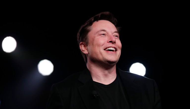 In this March 14, 2019, file photo Tesla CEO Elon Musk speaks before unveiling the Model Y at Tesla's design studio in Hawthorne, Calif. 