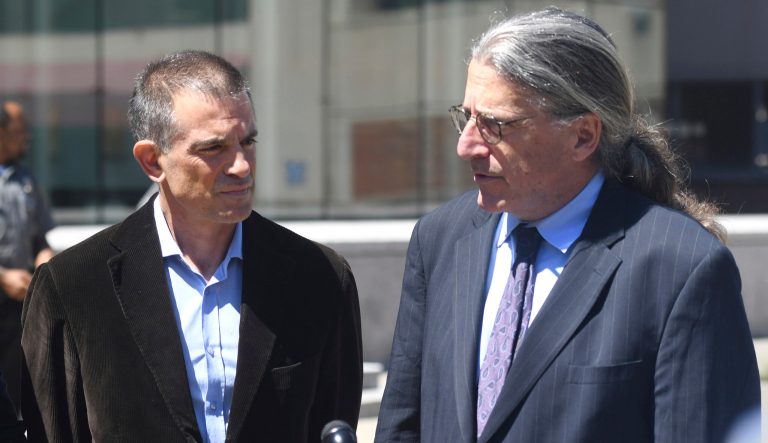 Fotis Dulos, left, is accompanied by his attorney Norm Pattis, after making an appearance at Connecticut Superior Court in Stamford, Conn. Wednesday, June 26, 2019. 