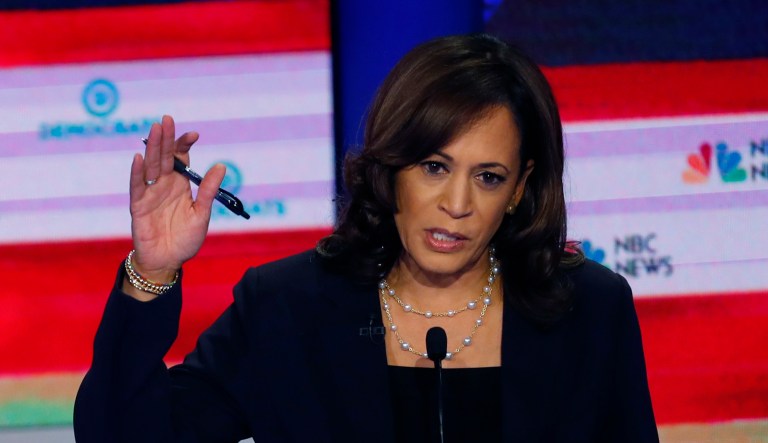 Democratic presidential candidate Sen. Kamala Harris, D-Calif., right, speaks during the Democratic primary debate hosted by NBC News at the Adrienne Arsht Center for the Performing Arts in Miami.
