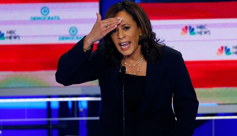 In this June 27, 2019, photo, Democratic presidential candidate Sen. Kamala Harris, D-Calif., gestures during the Democratic primary debate hosted by NBC News at the Adrienne Arsht Center for the Performing Arts in Miami. 