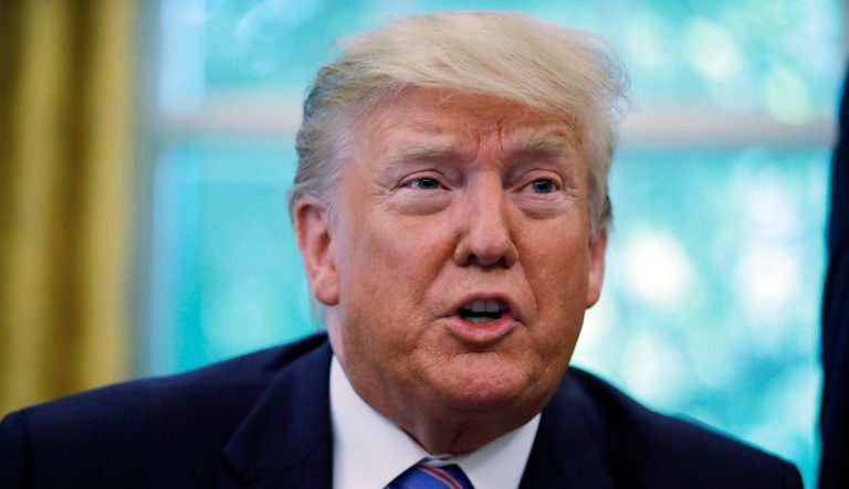 President Donald Trump talks during a signing ceremony in the Oval Office of the White House in Washington, Monday, July 1, 2019, with Vice President Mike Pence, left, and Secretary of Health and Human Services Alex Azar. The president signed a $4.6 billion aid package to help the federal government cope with the surge of Central American immigrants at the U.S.-Mexico border.  