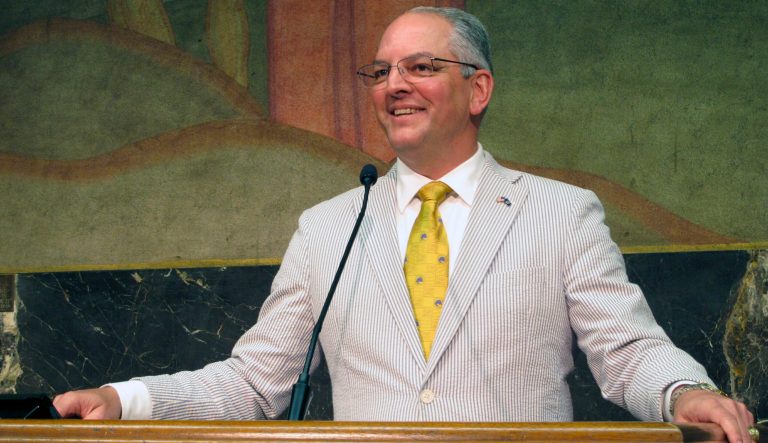 In this June 6, 2019 photo, Democratic Gov. John Bel Edwards smiles as he describes the end of a legislative session that saw his teacher pay raise and education spending plans win final passage, in Baton Rouge, La. 