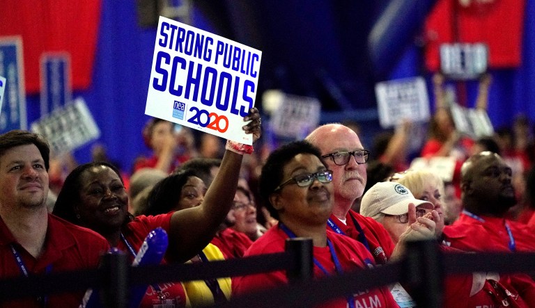 Delegates listens to Democratic presidential candidates speak during the National Education Association Strong Public Schools Presidential Forum on July 5 in Houston.