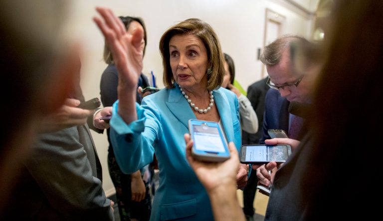 House Speaker Nancy Pelosi of Calif. speaks to reporters following a House Democratic caucus meeting on Capitol Hill in Washington, Wednesday, July 10, 2019. 