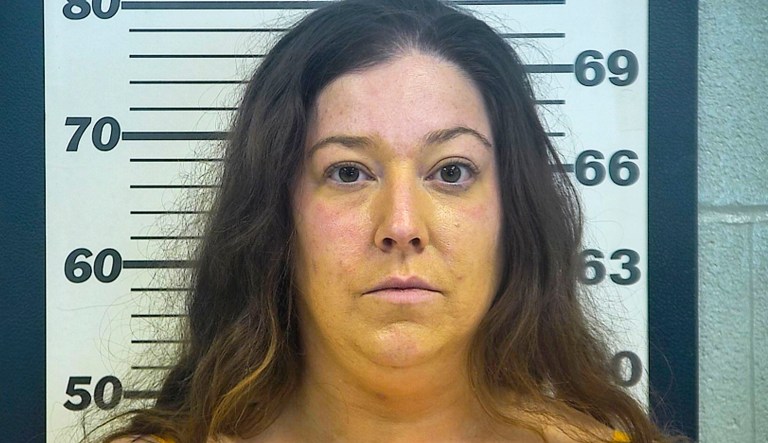 This undated booking photo provided by the Platte County Sheriff's Office shows Vanessa Richey of Kansas City, who was charged Tuesday, with first-degree making a terrorist threat and unlawful use of a weapon after firing a gun outside a Department of Motor Vehicles office, apparently because she was upset about the long wait in line. KMBC-TV reports that witnesses told authorities that Richey complained about the wait time Tuesday morning, calling it "ridiculous."