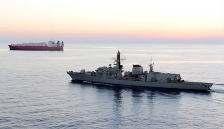 In this image from 2014 file video provided by UK Ministry of Defence, British navy vessel HMS Montrose escorts a ship.