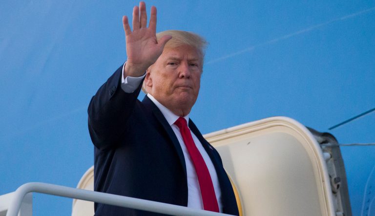 President Donald Trump waves as he boards Air Force One to depart Cleveland-Hopkins International Airport, Friday, July 12, 2019, in Cleveland. 