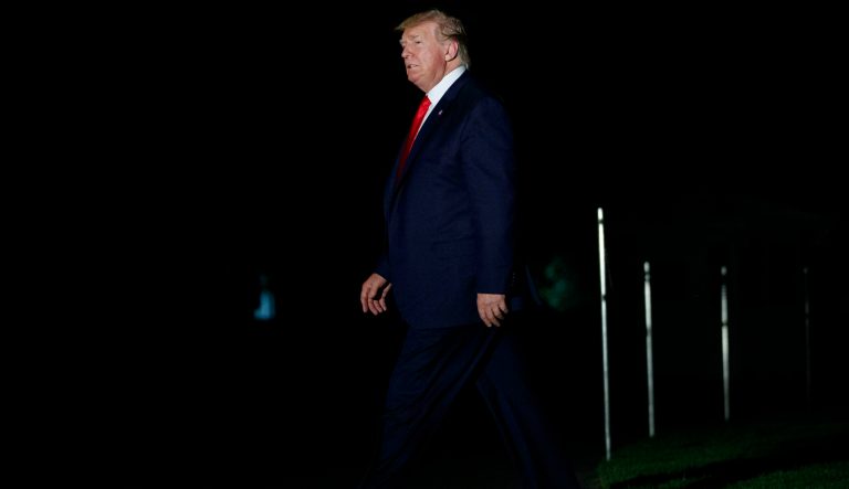 President Donald Trump walks from Marine One and across the South Lawn at the White House in Washington, Friday, July 12, 2019, as he returns from Cleveland, Ohio. 