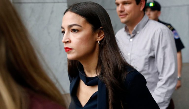 Louisiana police officer suggests AOC should be shot Rep. Alexandria Ocasio-Cortez, D-N.Y., walks out of a House of Representatives office building, Tuesday, July 16, 2019, on Capitol Hill in Washington.