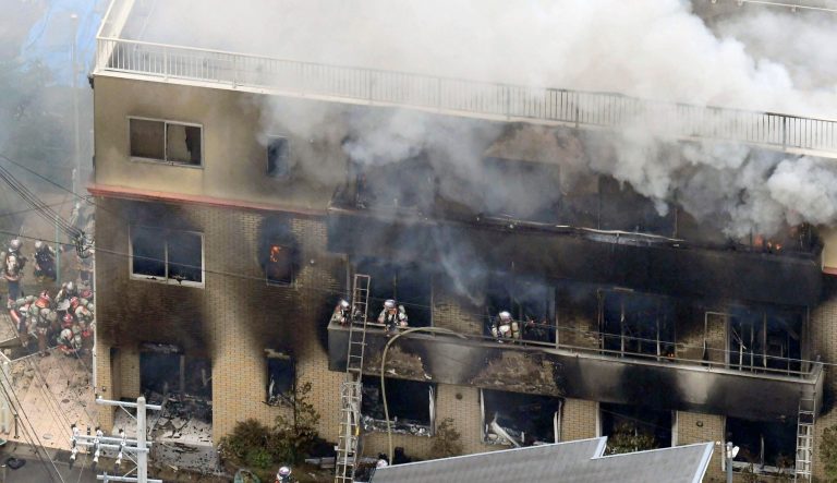 Firefighters respond to a building fire of Kyoto Animation in Kyoto, western Japan, Thursday, July 18, 2019. 