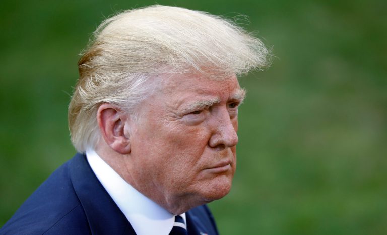 President Donald Trump speaks to members of the media before boarding Marine One helicopter on the South Lawn of the White House in Washington, for the short flight to nearby Andrews Air Force Base, Md., Friday, July 19, 2019. 