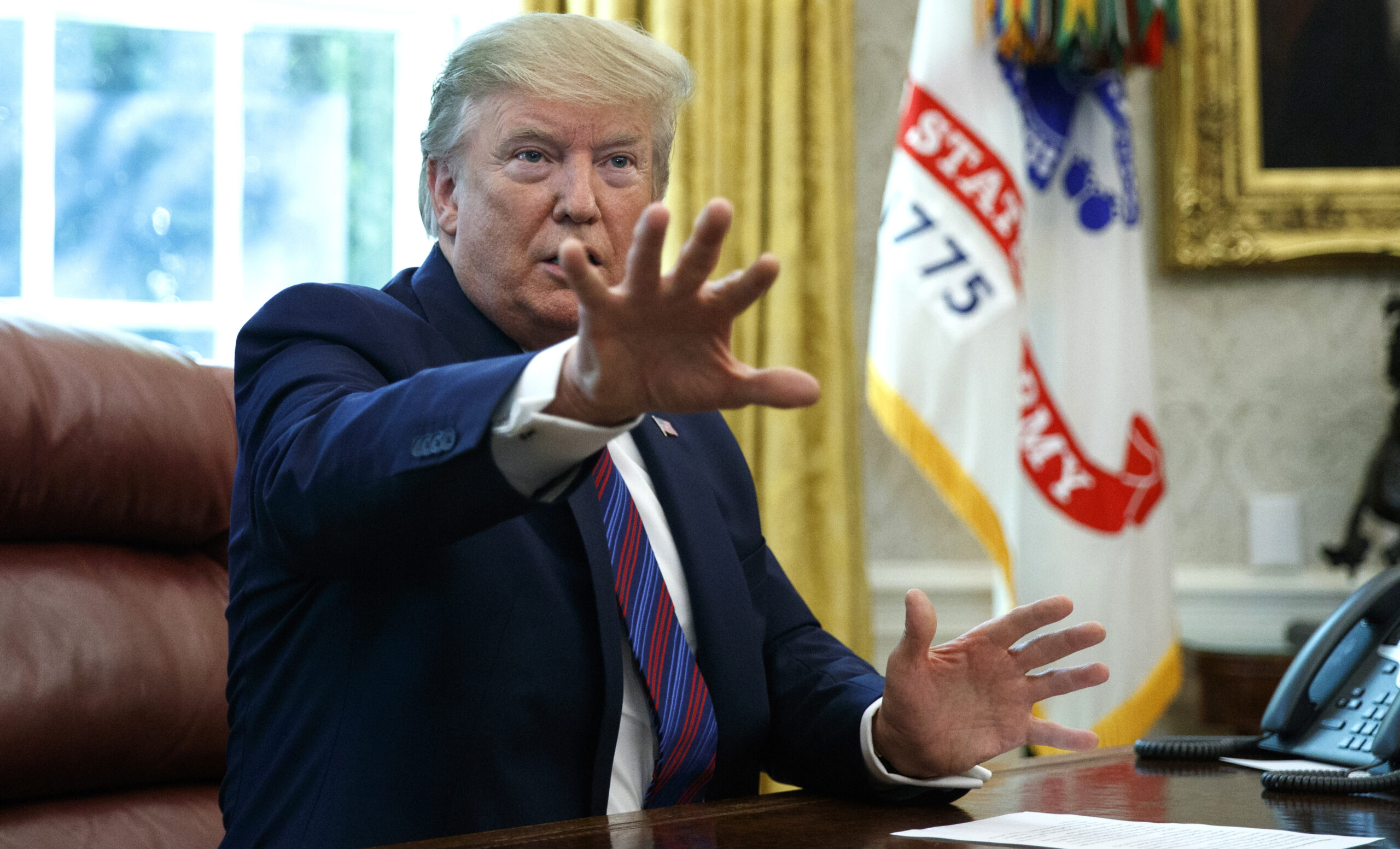 Trump calls Elijah Cummings ‘racist’ amid Baltimore feud