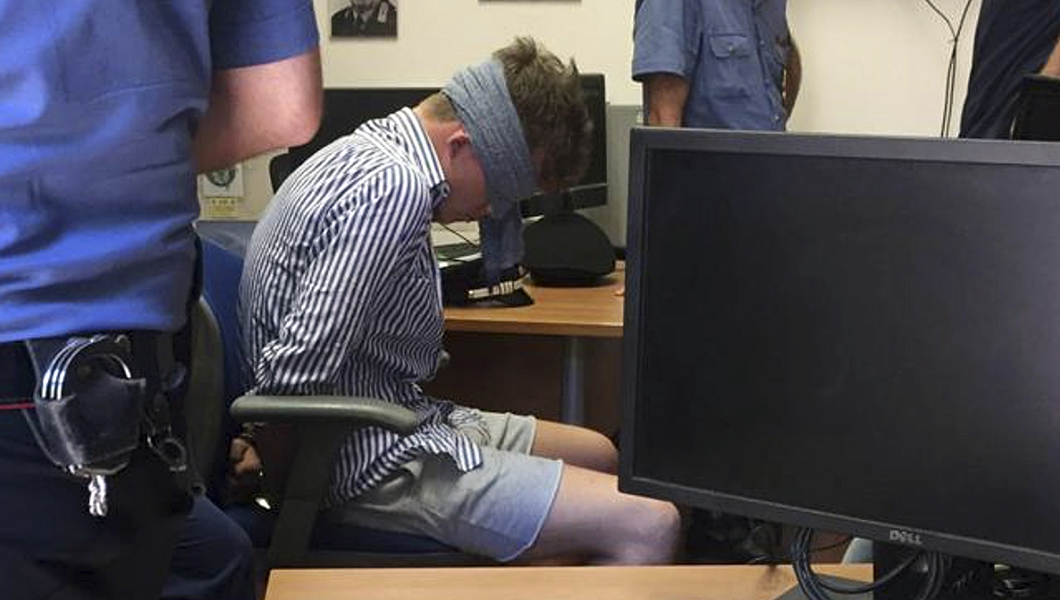 American teen murder suspect shown blindfolded in Rome police station