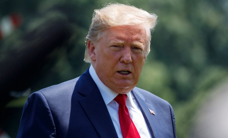 President Donald Trump prepares to speak to the media as arrives at the White House in Washington, Tuesday, July 30, 2019, as the returns from Virgina. 