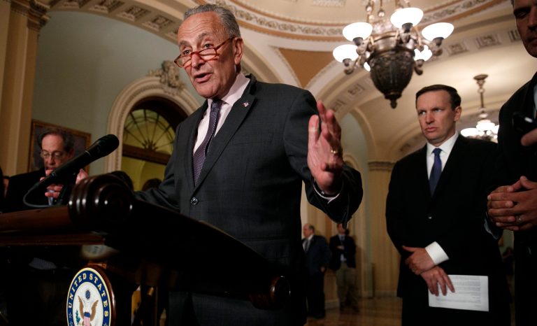 Senate Minority Leader Sen. Chuck Schumer of N.Y., left, with Sen. Chris Murphy, D-Conn., speaks to the media with members of Senate Democratic leadership, Tuesday, July 30, 2019, after their weekly policy luncheon on Capitol Hill in Washington. 