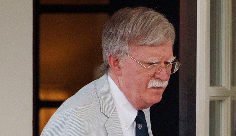 National security adviser John Bolton walks from the West Wing.