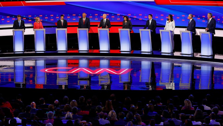 From left, Sen. Michael Bennet, D-Colo., Sen. Kirsten Gillibrand, D-N.Y., former Housing and Urban Development Secretary Julian Castro, Sen. Cory Booker, D-N.J., former Vice President Joe Biden, Sen. Kamala Harris, D-Calif., Andrew Yang, Rep. Tulsi Gabbard, D-Hawaii, Washington Gov. Jay Inslee and New York City Mayor Bill de Blasio participate in the second of two Democratic presidential primary debates hosted by CNN Wednesday, July 31, 2019, in the Fox Theatre in Detroit. 