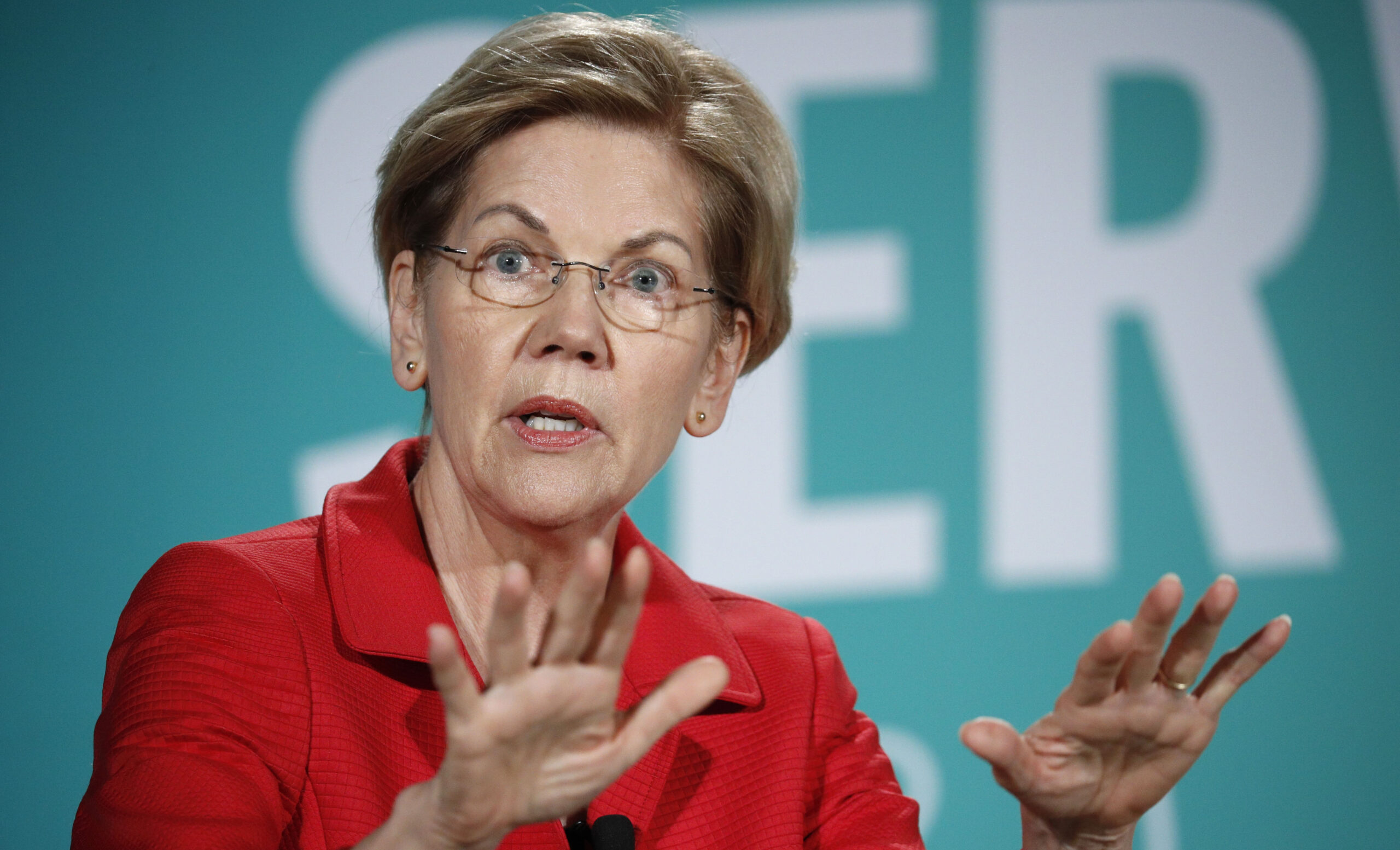 Warren touts presidential transition crackdown after Trump ethics scandals