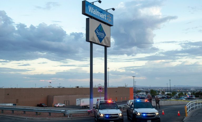 Texas state police cars block the access to the Walmart store in the aftermath of a mass shooting in El Paso, Texas, Saturday, Aug. 3, 2019. 