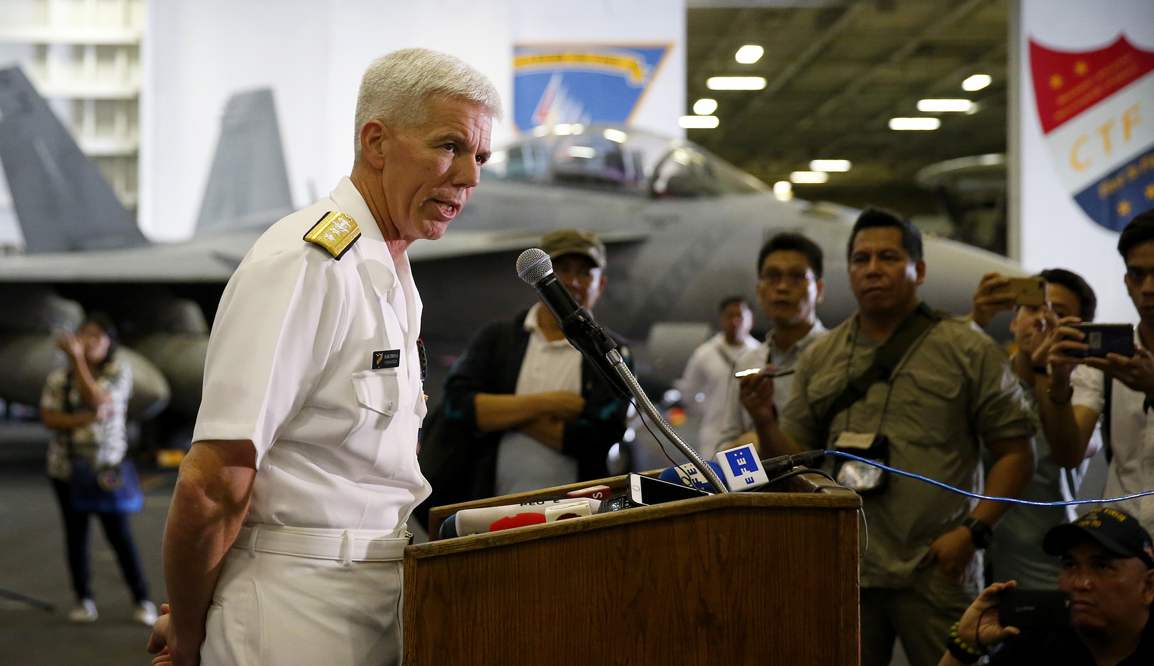 ‘Peace through strength’: Navy sails an aircraft carrier through disputed South China Sea