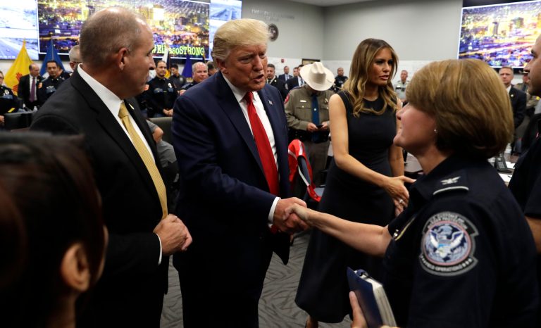 President Donald Trump and first lady Melania Trump speak to first responders as they visit the El Paso Regional Communications Center after meeting with people affected by the El Paso mass shooting, Wednesday, Aug. 7, 2019, in El Paso, Texas. 