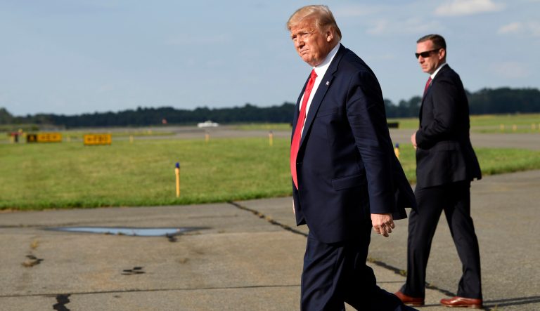 President Donald Trump walks towards Marine One at Morristown Municipal Airport in Morristown, N.J., Friday, Aug. 9, 2019, to take the short trip to his golf club where he will be vacationing for a week. 