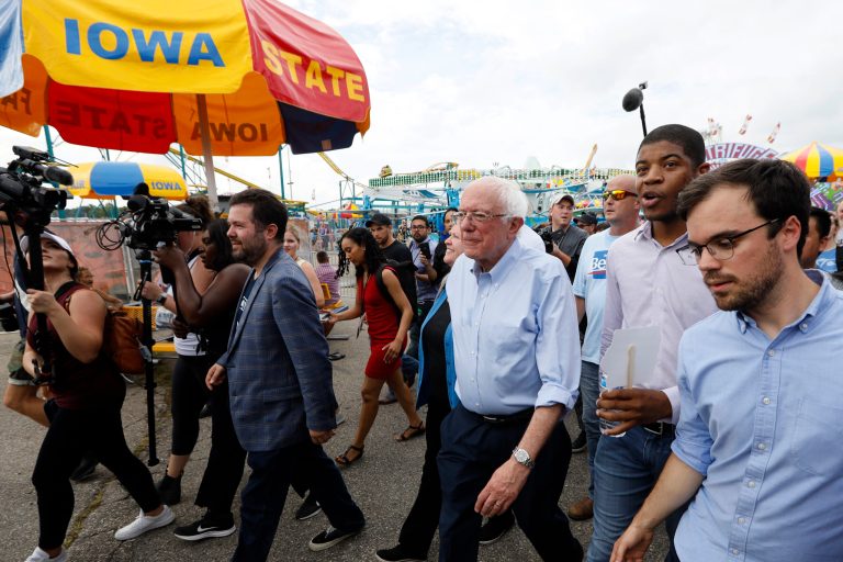Sen. Bernie Sanders walks on the midway during a visit to the Iowa State Fair, Sunday, Aug. 11, 2019, in Des Moines, Iowa.