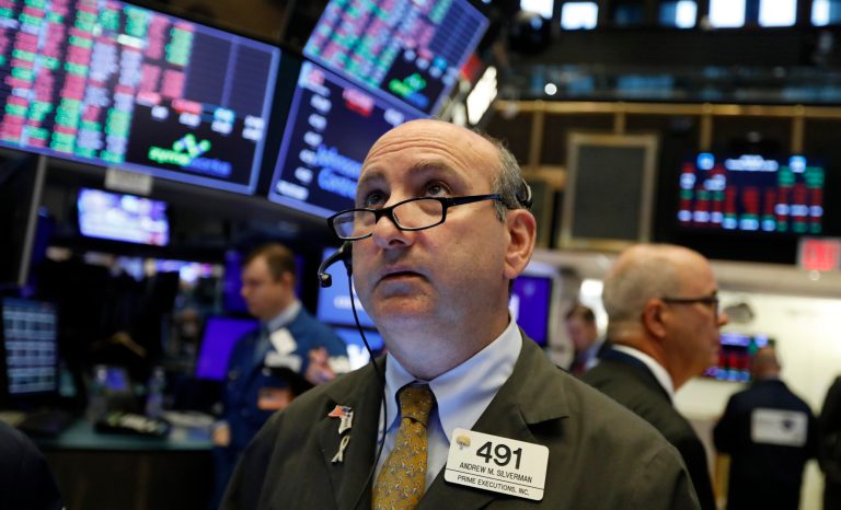 In this Tuesday, Aug. 13, 2019, photo trader Andrew Silverman works on the floor of the New York Stock Exchange. The threat of a recession doesnât seem so remote anymore, and stocks sank Wednesday after the bond market threw up one of its last remaining warning flags on the economyâs health. 