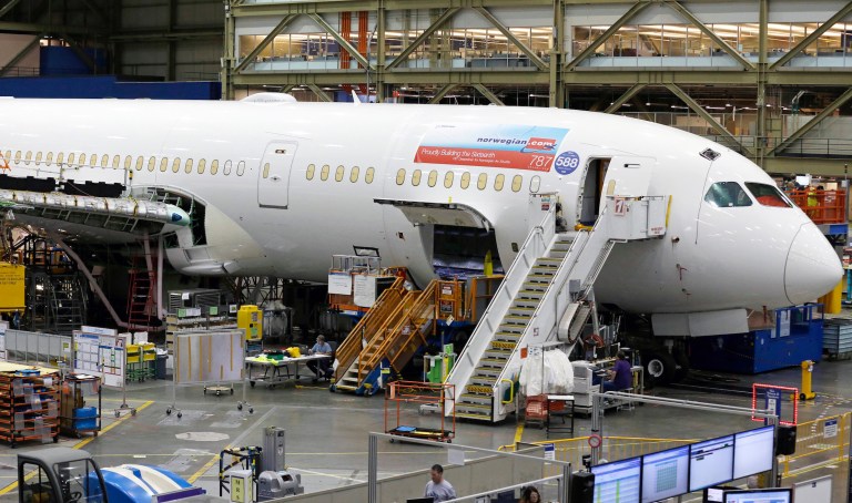 This Monday, June 12, 2017, photo shows a Boeing 787 being built for Norwegian Air Shuttle at Boeing Co.'s assembly facility, in Everett, Wash. (AP Photo/Ted S. Warren)