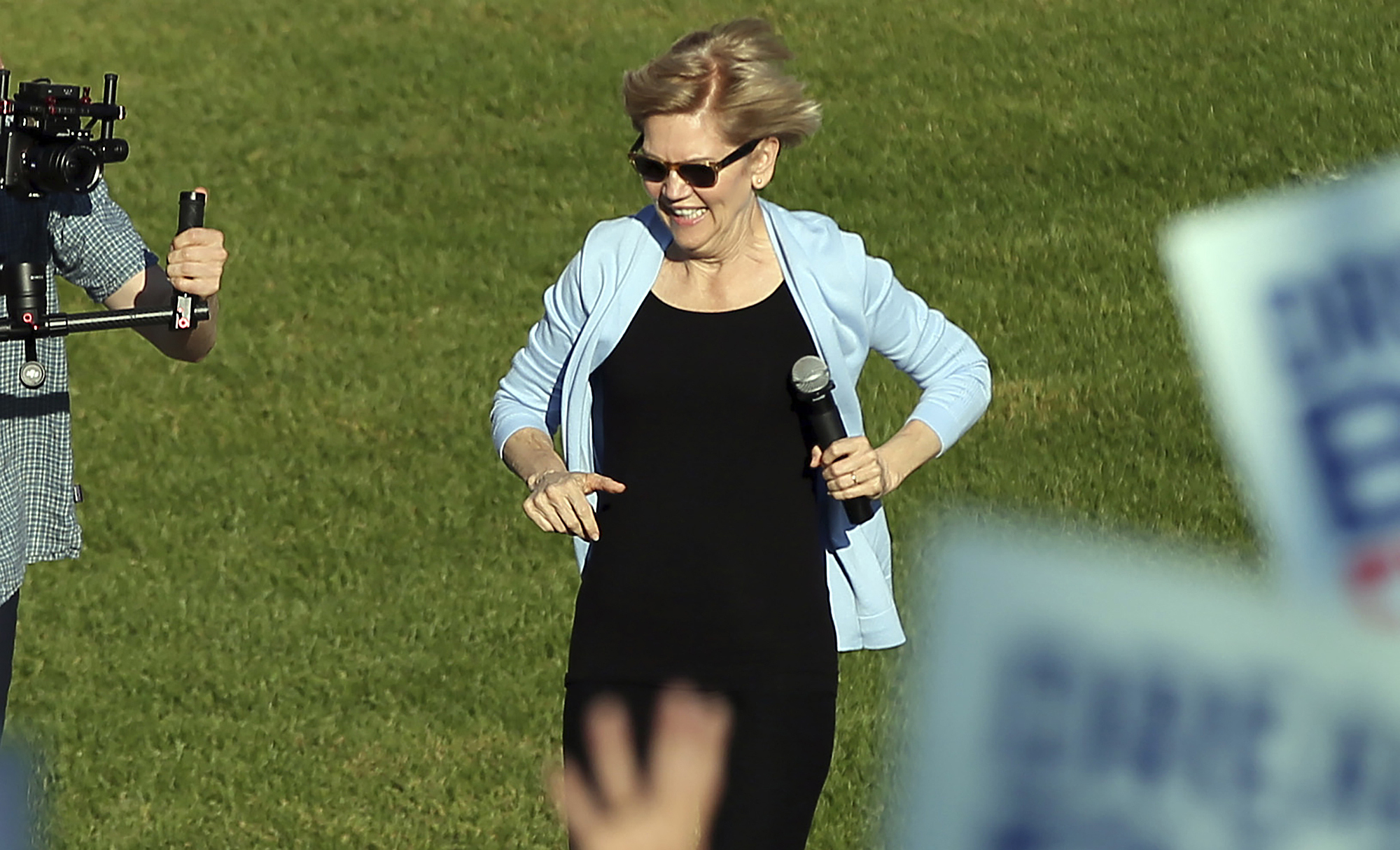 With a spring in her step, Warren, 70, breezes past scrutiny of her age