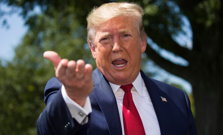 President Donald Trump speaks with reporters before departing on Marine One on the South Lawn of the White House, Wednesday, Aug. 21, 2019, in Washington. Trump is headed to Kentucky. 