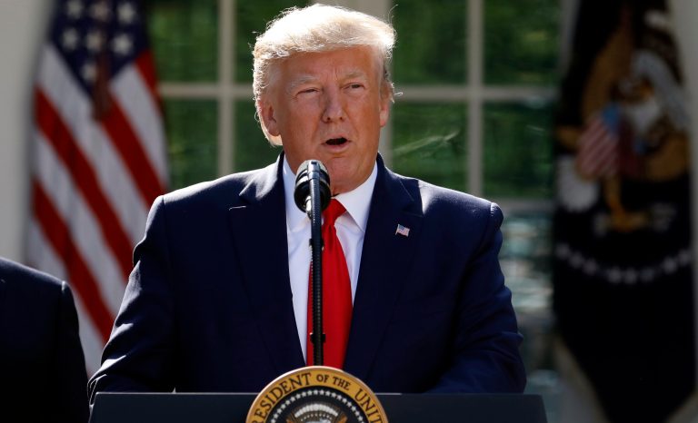 In this Aug. 29, 2019 photo President Donald Trump speaks in the Rose Garden of the White House in Washington. T