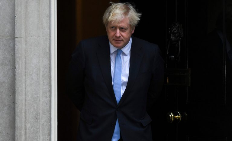 Britain's Prime Minister Boris Johnson walks out to meet Israeli Prime Minister Benjamin Netanyahu from 10 Downing Street, in London, Thursday, Sept. 5, 2019.
