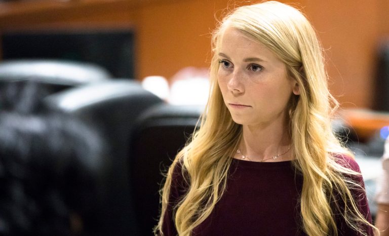 Brooke "Skylar" Richardson steps out of the courtroom during a recess of proceedings, Friday, Sept. 6, 2019, at Warren County Common Pleas Court in Lebanon, Ohio. 