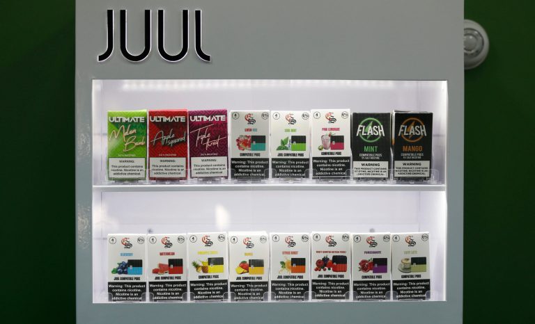 In this Tuesday, Sept. 3, 2019, photo, E-Cigarette pods are displayed for sale at Good Guys Vape Shop, in Biddeford, Maine. 