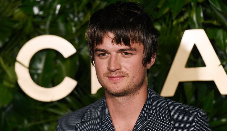 Actor Joe Keery poses at the launch of the Gabrielle Chanel Essence fragrance at the Chateau Marmont, Thursday, Sept. 12, 2019, in Los Angeles.
