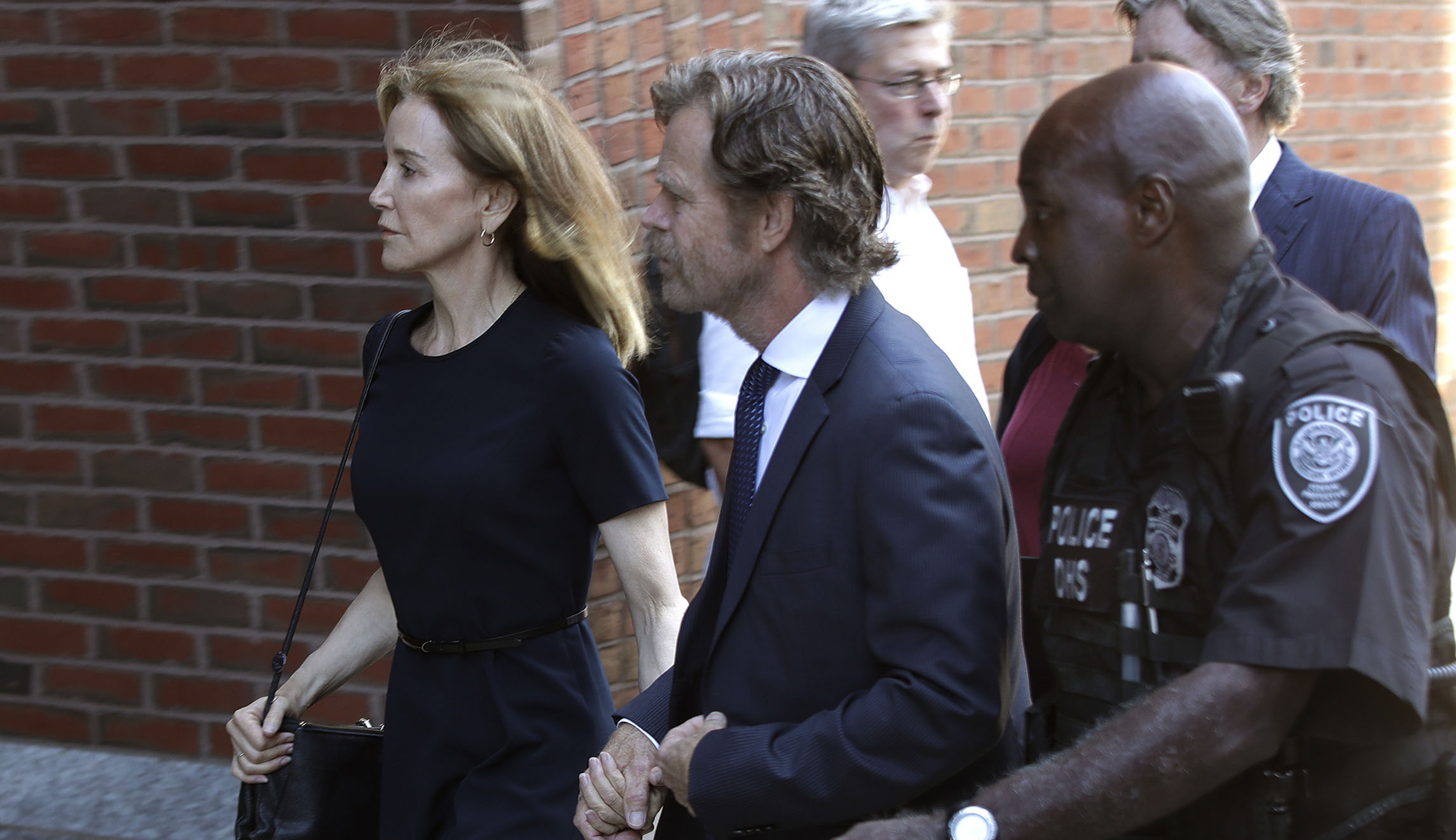 Felicity Huffman sentenced to 14 days in prison for college bribery scandal