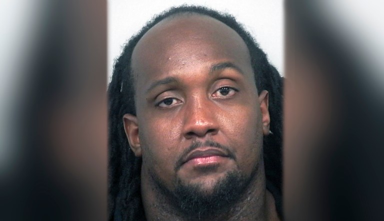 This undated photo provided by the Gwinnett County, Georgia, Police Department shows Edawn Louis Coughman. Police say Coughman trashed his restaurant and ice cream shop near Atlanta to fake a racially motivated burglary. 