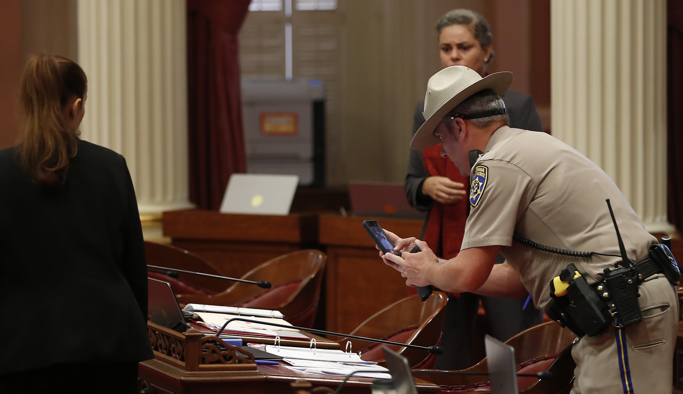 Protester hurls apparent menstrual blood in California Senate