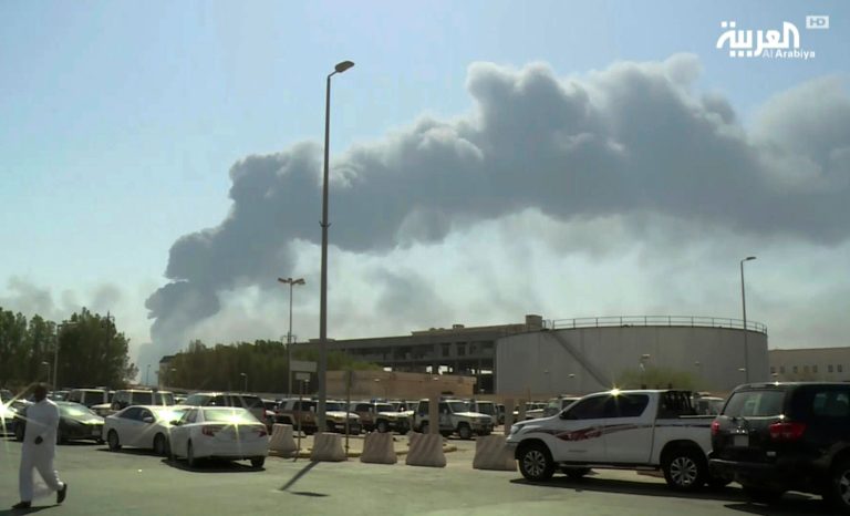 In this Saturday, Sept. 14, 2019 photo, made from a video broadcast on the Saudi-owned Al-Arabiya satellite news channel, smoke from a fire at the Abqaiq oil processing facility fills the skyline, in Buqyaq, Saudi Arabia. 
