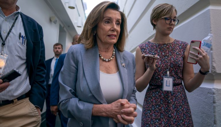 Speaker of the House Nancy Pelosi, D-Calif., arrives for a closed-door meeting with the House Democratic Caucus, Wednesday, Sept. 18, 2019, at the Capitol in Washington. 
