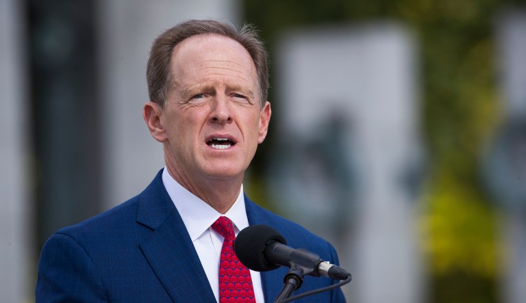 Sen. Pat Toomey, R-Pennsylvania, speaks during a ceremony to award World War II veteran Clarence Smoyer, 96, the Bronze Star at the World War II Memorial, Wednesday, Sept. 18, 2019, in Washington. 