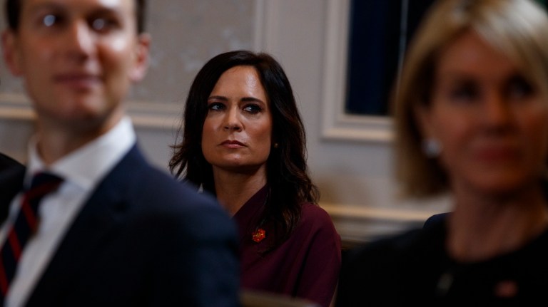 White House press secretary Stephanie Grisham listens during a meeting between President Donald Trump and Pakistani Prime Minister Imran Khan at the InterContinental Barclay hotel during the United Nations General Assembly, Monday, Sept. 23, 2019, in New York. 