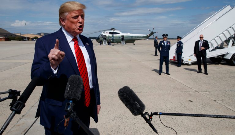 President Donald Trump talks with reporters after arriving at Andrews Air Force Base, Thursday, Sept. 26, 2019, in Andrews Air Force Base, Md. 