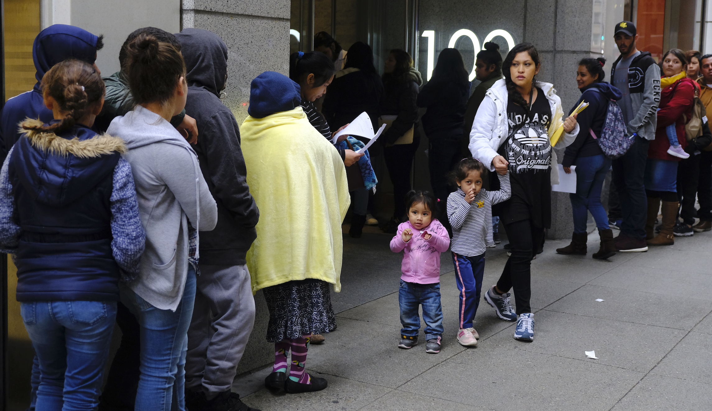 Judge blocks Trump rule restricting immigrants reliant on public assistance