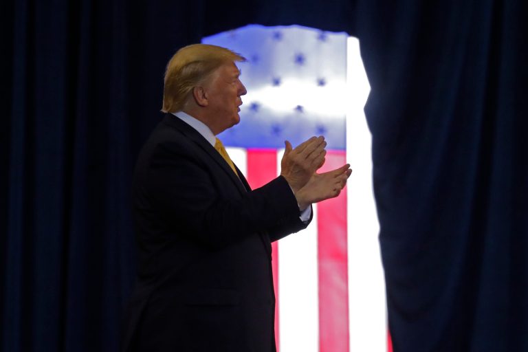 President Donald Trump arrives to speak at a campaign rally in Lake Charles, La., Friday.