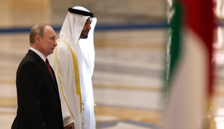 Russian President Vladimir Putin, left, and Abu Dhabi Crown Prince Mohamed bin Zayed al-Nahyan attend the official welcome ceremony in Abu Dhabi, United Arab Emirates, Tuesday, Oct. 15, 2019.