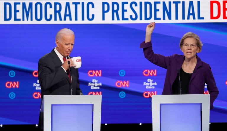 Democratic presidential candidate former Vice President Joe Biden and Sen. Elizabeth Warren, D-Mass., participate in a Democratic presidential primary debate hosted by CNN/New York Times at Otterbein University, Tuesday, Oct. 15, 2019, in Westerville, Ohio.