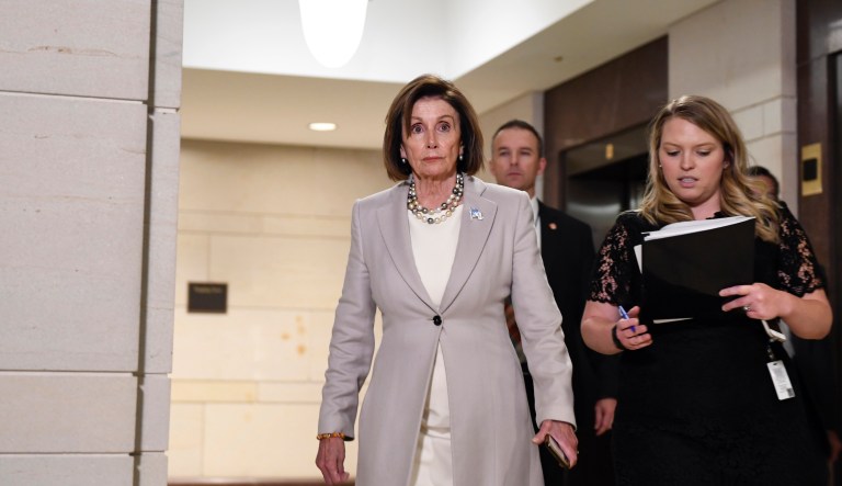 House Speaker Nancy Pelosi of Calif., walks on Capitol Hill in Washington, Thursday, Oct. 17, 2019, near the area where U.S. Ambassador to the European Union Gordon Sondland is being interviewed as part of the impeachment inquiry. 